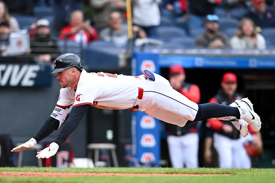 CLEVELAND, OHIO - MAY 31: Nolan Jones #22 of the Cleveland Guardians scores on an error after hitting an RBI triple during the fourth inning against the Los Angeles Angels at Progressive Field on May 31, 2025 in Cleveland, Ohio. (Photo by Nick Cammett/Getty Images)
