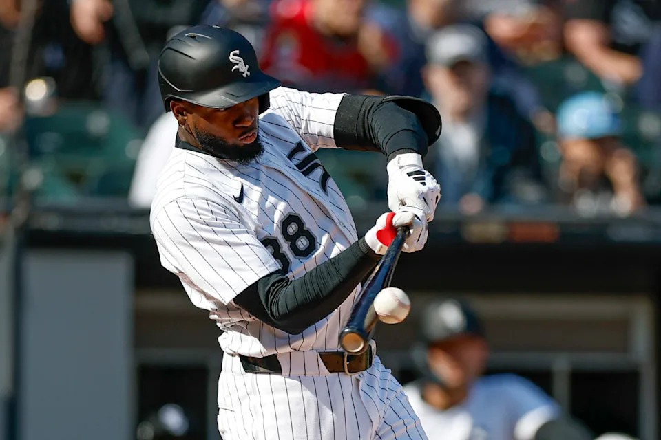 Chicago White Sox center fielder Luis Robert Jr. (88) doubles against the Texas Rangers during the fourth inning at Rate Field. Mandatory Credit: Kamil Krzaczynski-Imagn Images© Kamil Krzaczynski-Imagn Images