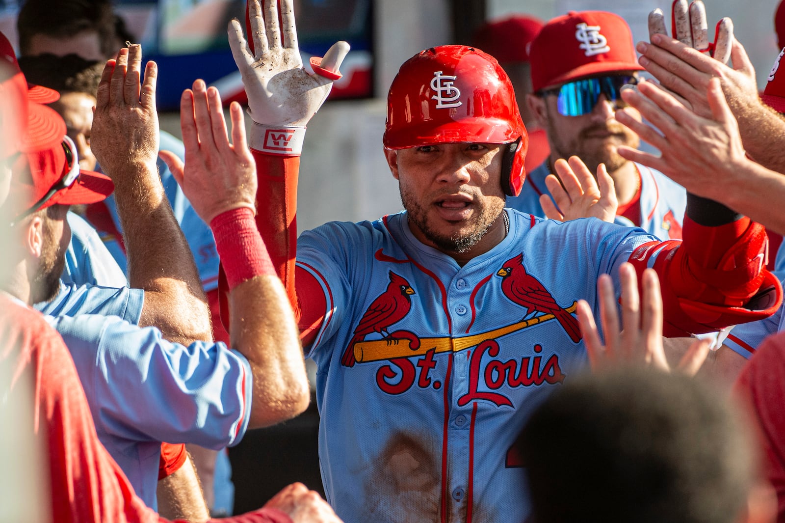 St. Louis Cardinals' Willson Contreras is congratulated by his teammates after hitting a solo home run off Cleveland Guardians relief pitcher Kolby Allard during the ninth inning of a baseball game, Saturday, June 28, 2025, in Cleveland. (AP Photo/Phil Long)
