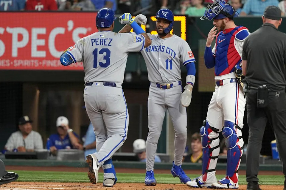 Kansas City Royals catcher Salvador Perez (13) celebrates his two-run home run with third baseman Maikel Garcia (11) against the Texas Rangers during the first inning at Globe Life Field on June 17, 2025.