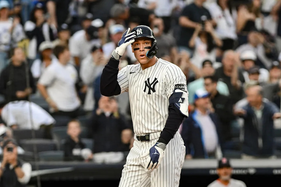 New York Yankees outfielder Aaron Judge (99) reacts after hitting a two-run home run against the Boston red Sox during the first inning at Yankee Stadium. Mandatory Credit: John Jones-Imagn Images