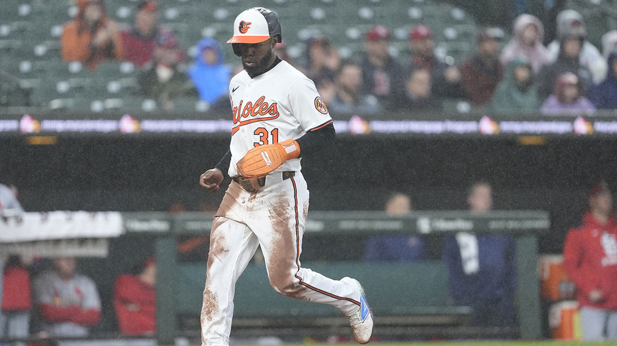 Baltimore Orioles center fielder Cedric Mullins (31) scores a run on Baltimore Orioles second baseman Jackson Holliday (7) (not pictured) RBI double against the St. Louis Cardinals during the second inning at Oriole Park at Camden Yards. 