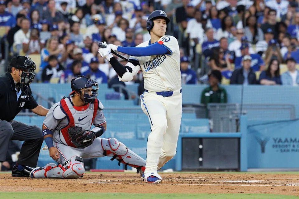 Dodgers star Shohei Ohtani strikes out during the third inning Saturday.