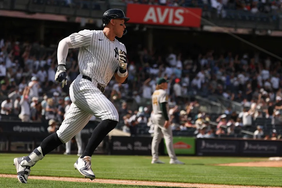 Aaron Judge (99) hits a two-run home run during the seventh inning against Athletics pitcher Tyler Ferguson (44) at Yankee Stadium. IMAGN IMAGES via Reuters Connect