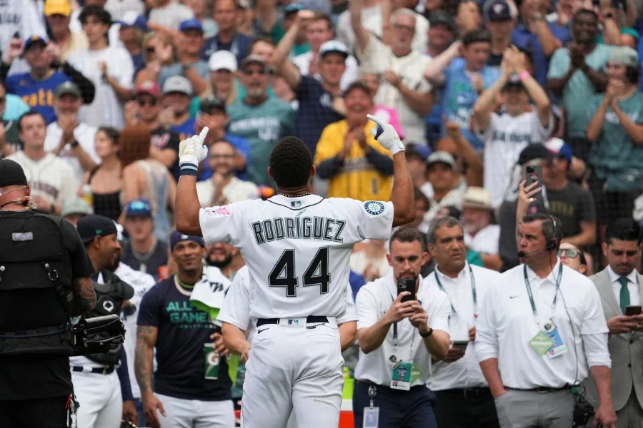 American League’s Julio Rodriguez, of the Seattle Mariners, reacts after he beat National League’s Pete Alonso, of the New York Mets, to advance to the second round during the MLB All-Star baseball Home Run Derby in Seattle, Monday, July 10, 2023. (AP Photo/Ted Warren)