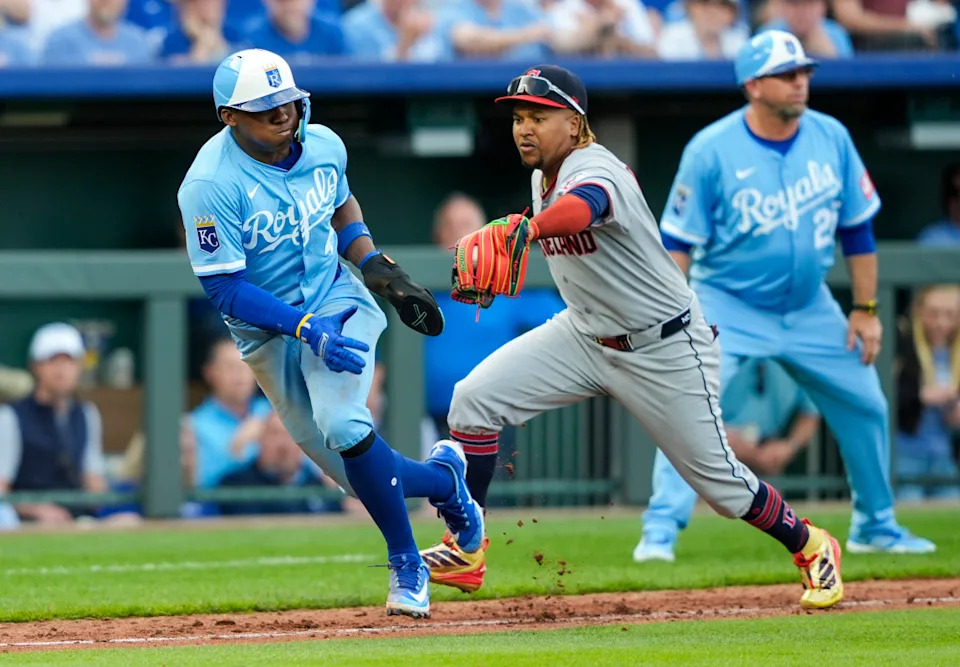 Kansas City Royals outfielder Dairon Blanco (44) is caught in a rundown © Jay Biggerstaff-Imagn Images