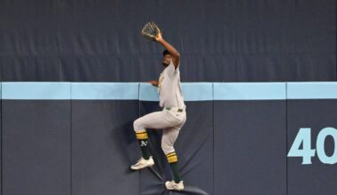 A's OF Denzel Clarke climbs wall to make incredible catch