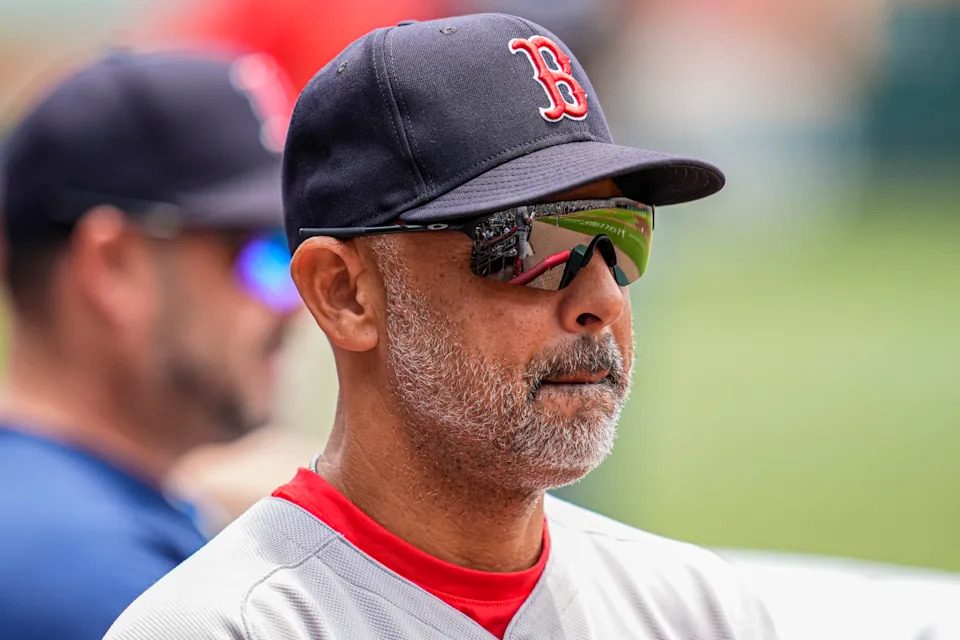 Boston Red Sox manager Alex Cora (13) in the dugout before the game against the Atlanta Braves at Truist Park.Dale Zanine-Imagn Images