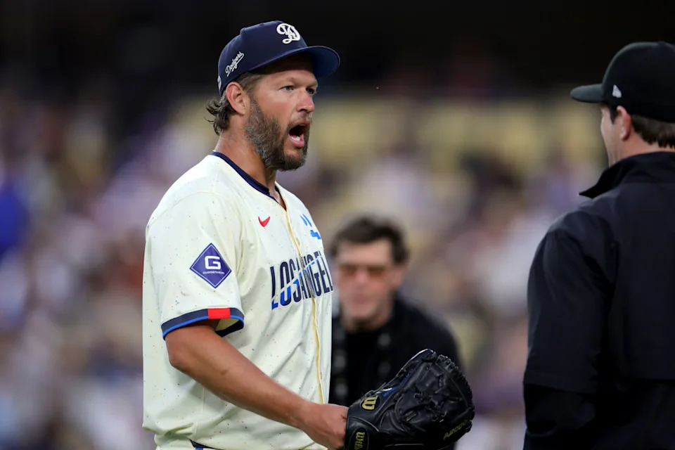 Dodgers pitcher Clayton Kershaw (22) reacts after walking off the mound against the Giants at Dodger Stadium.Ryan Sun-Imagn Images