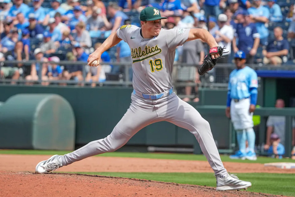 Athletics pitcher Mason Miller (19) delivers a pitch against the Kansas City Royals in the ninth inning of the game at Kauffman Stadium.Denny Medley-Imagn Images