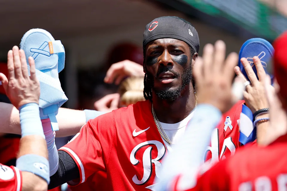 Cincinnati Reds shortstop Elly De La Cruz (44) receives congratulations from teammates after scoring in the fourth inning against the Detroit Tigers at Comerica Park in Detroit on Sunday, June 15, 2025.