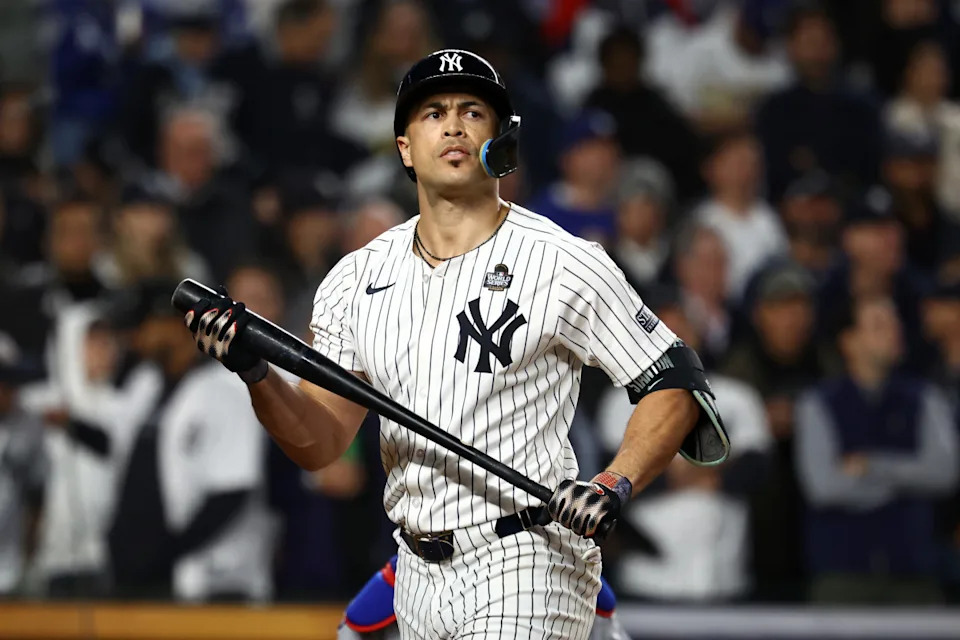 Oct 29, 2024; Bronx, New York, USA; New York Yankees designated hitter Giancarlo Stanton (27) reacts after striking out against the Los Angeles Dodgers in the fifth inning during game four of the 2024 MLB World Series at Yankee Stadium.Vincent Carchietta-Imagn Images
