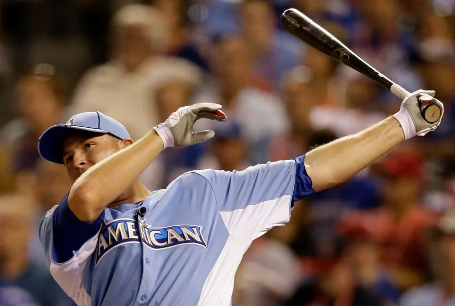 American League’s Mark Trumbo, of the Los Angeles Angels, swings during the second round of the MLB All-Star baseball Home Run Derby, Monday, July 9, 2012, in Kansas City, Mo. (AP Photo/Jeff Roberson)