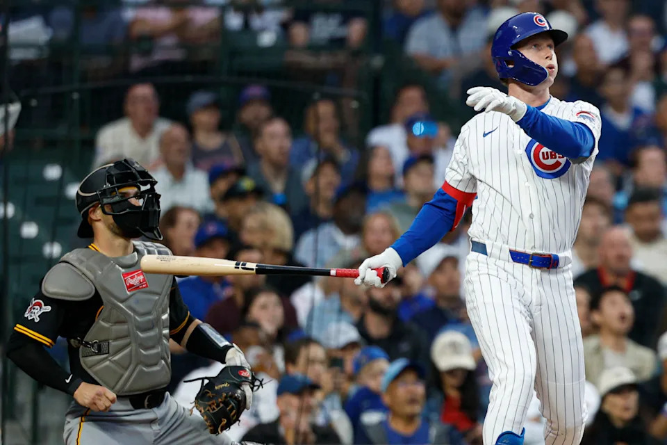 Chicago Cubs center fielder Pete Crow-Armstrong (4) hits a two-run home run against the Pittsburgh Pirates during the fourth inning at Wrigley Field.Kamil Krzaczynski-Imagn Images