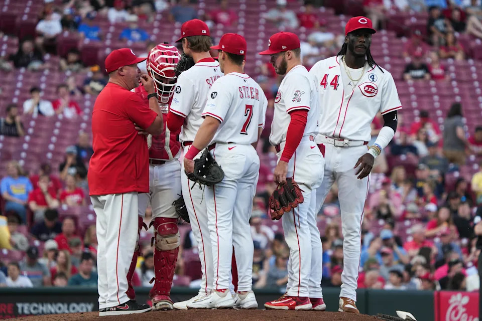 The Reds take to the pitchers mound during their game against the Brewers at Great American Ball Park on Lou Gehrig's Day, Monday June 2, 2025.