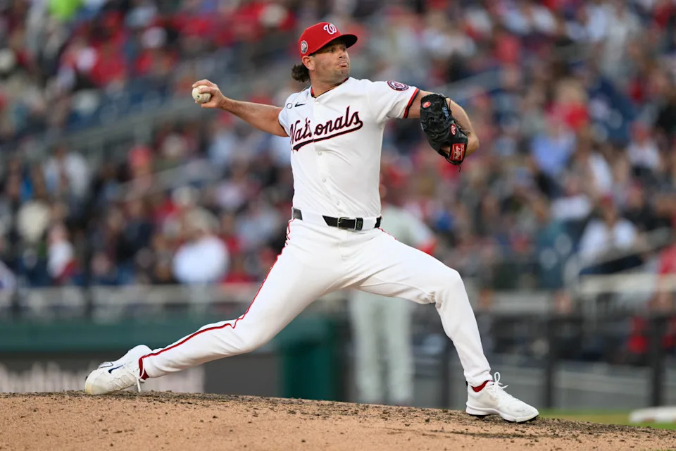 Washington Nationals pitcher Kyle Finnegan (67) throws a pitch during the ninth inning against the Philadelphia Phillies at Nationals Park.Reggie Hildred-Imagn Images