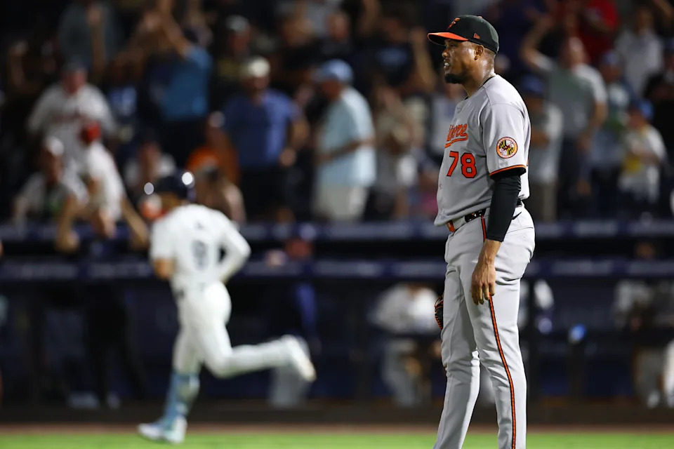 TAMPA, FLORIDA - JUNE 18: Yennier Cano #78 of the Baltimore Orioles reacts after giving up a two-run home run to Brandon Lowe #8 of the Tampa Bay Rays in the fifth inning at George M. Steinbrenner Field on June 18, 2025 in Tampa, Florida. (Photo by Julio Aguilar/Getty Images)