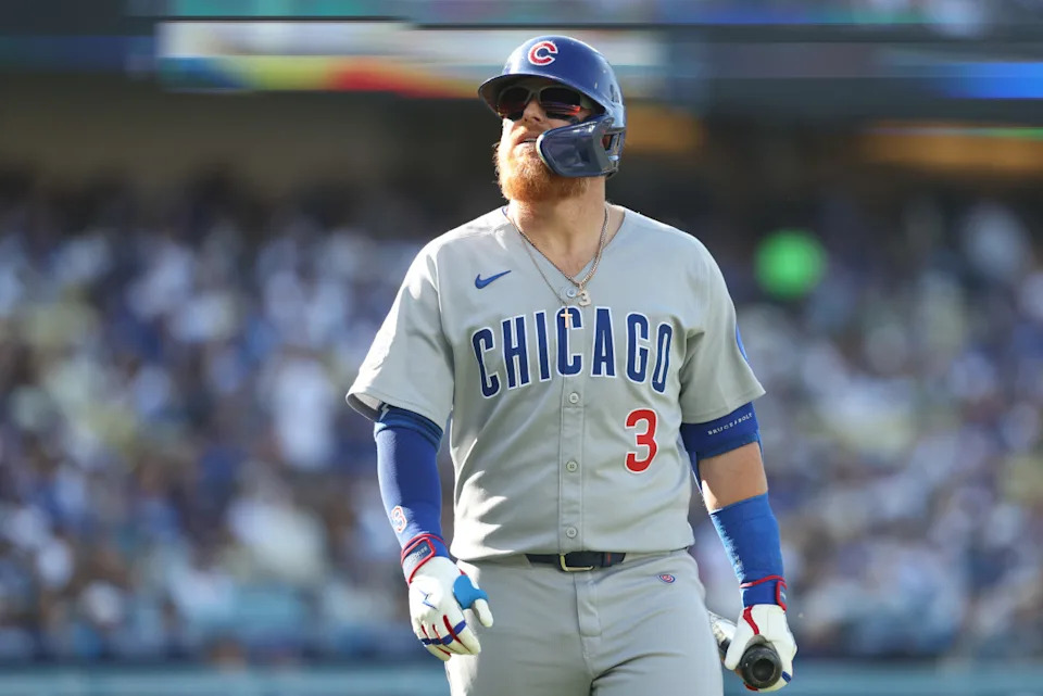Chicago Cubs first baseman Justin Turner (3) reacts after striking out against the Los Angeles Dodgers during the fourth inning of the game at Dodger Stadium.Kiyoshi Mio-Imagn Images