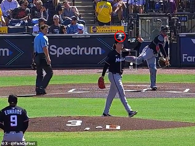 Ryan Weathers is hit in the head by a throw from his own catcher Nick Fortes before the game