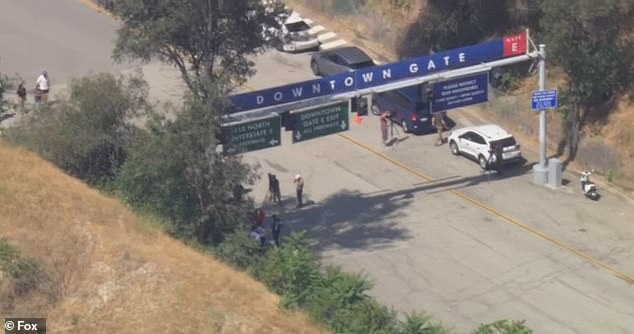 Photographs captured at the ballpark showed several masked agents staged near Gate E