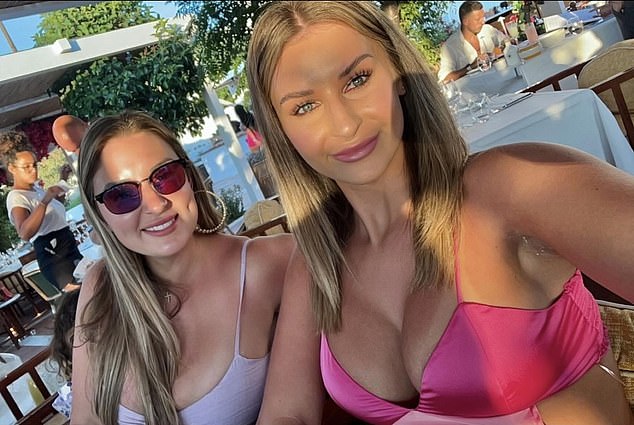 Alicia Huggins (right) was pictured on camera during the LSU victory on Sunday