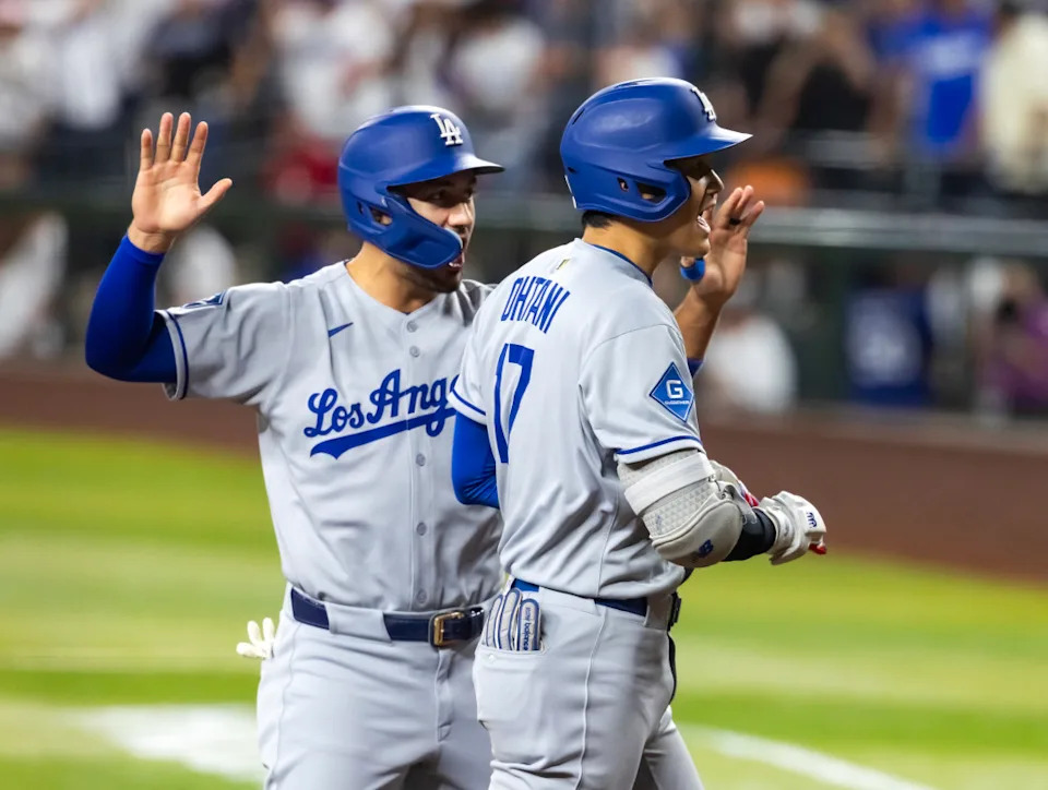 Shohei Ohtani and Michael Conforto of the Los Angeles Dodgers.Mark J. Rebilas-Imagn Images