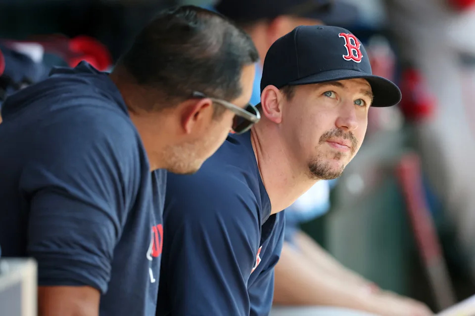 Boston Red Sox starting pitcher Walker Buehler (0, right) looks up in the dugout during the eighth inning against the Los Angeles Angels at Angel Stadium.Kiyoshi Mio-Imagn Images