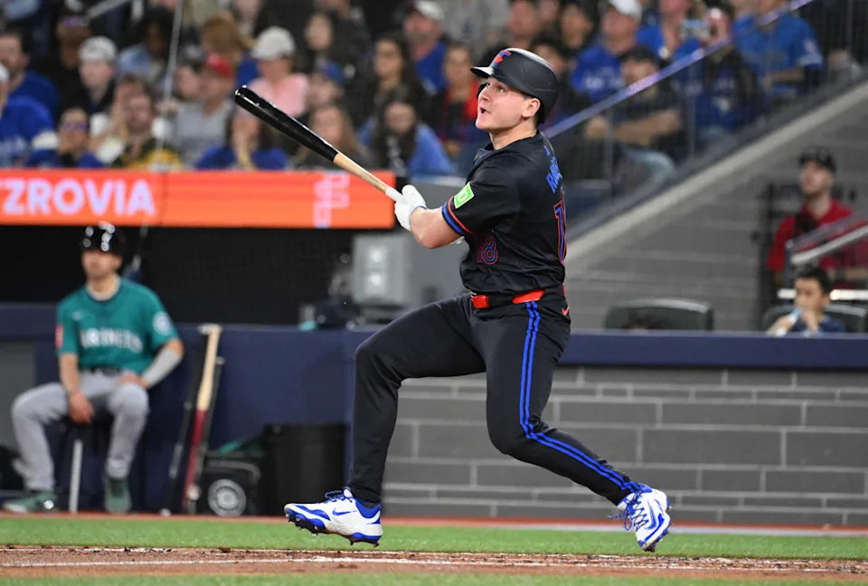 Toronto Blue Jays left fielder Alan Roden (18)© Dan Hamilton-Imagn Images