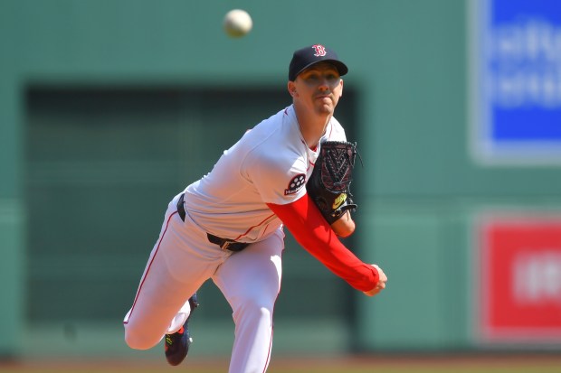 Boston Red Sox's Walker Buehler delivers a pitch to a Chicago White Sox batter in the first inning of a game on Monday in Boston. (AP Photo/Steven Senne)