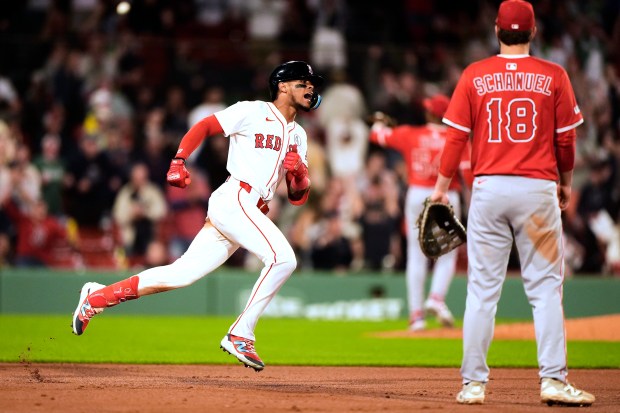 The Boston Red Sox’s Ceddanne Rafaela celebrates as he runs...