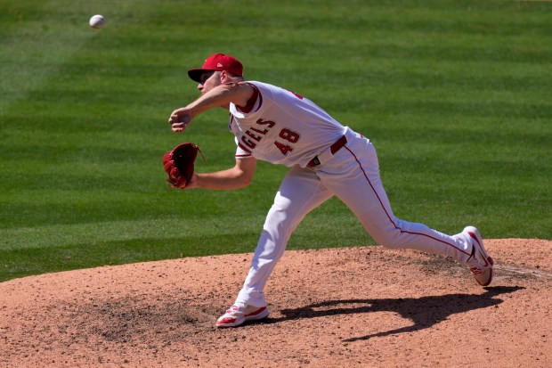 Angels pitcher Reid Detmers throws to the plate during the...