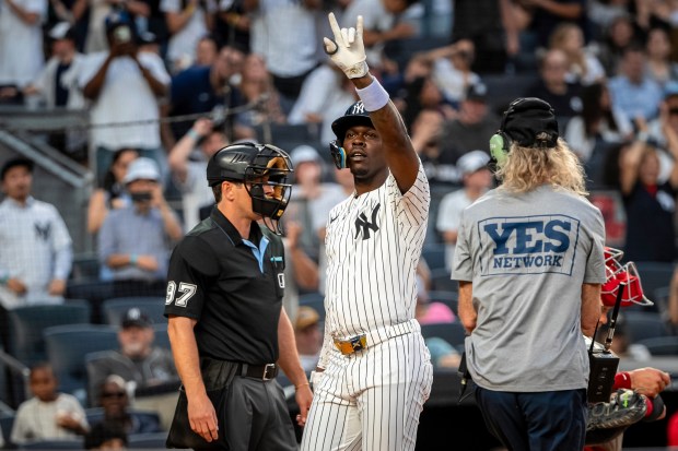 The New York Yankees’ Jazz Chisholm Jr. celebrates after hitting...