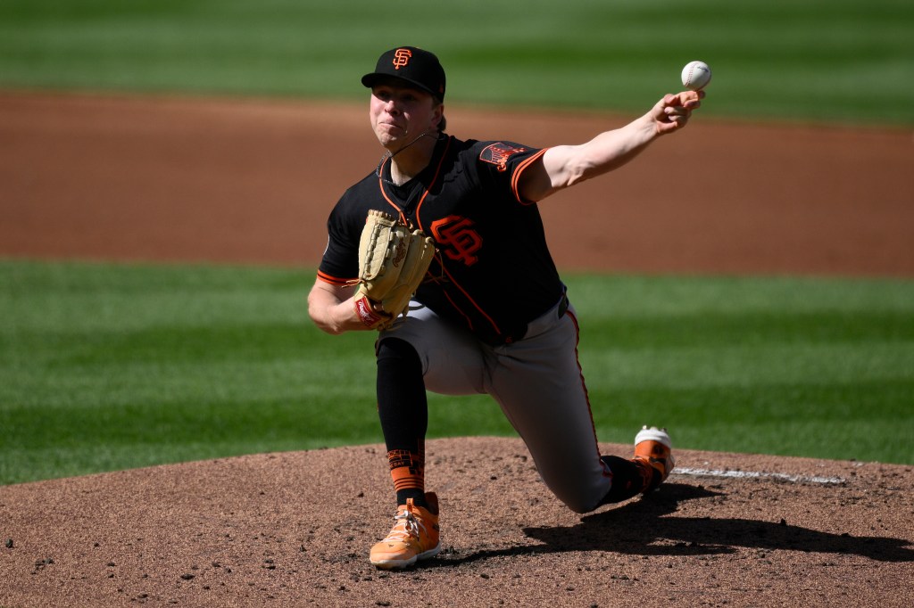 San Francisco Giants starting pitcher Kyle Harrison throws during the second inning of a baseball game against the Washington Nationals, Saturday, May 24, 2025, in Washington.
