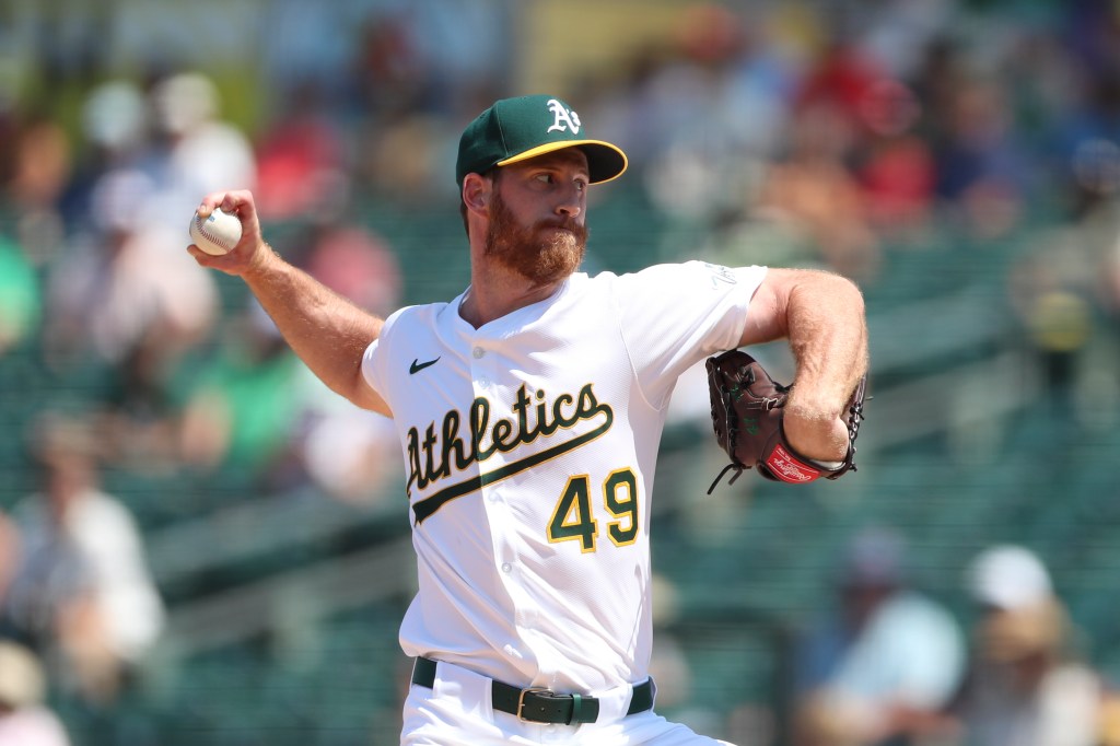 Athletics pitcher Michael Kelly throws to a Minnesota Twins batter during the seventh inning of a baseball game Thursday, June 5, 2025, in West Sacramento, Calif. 