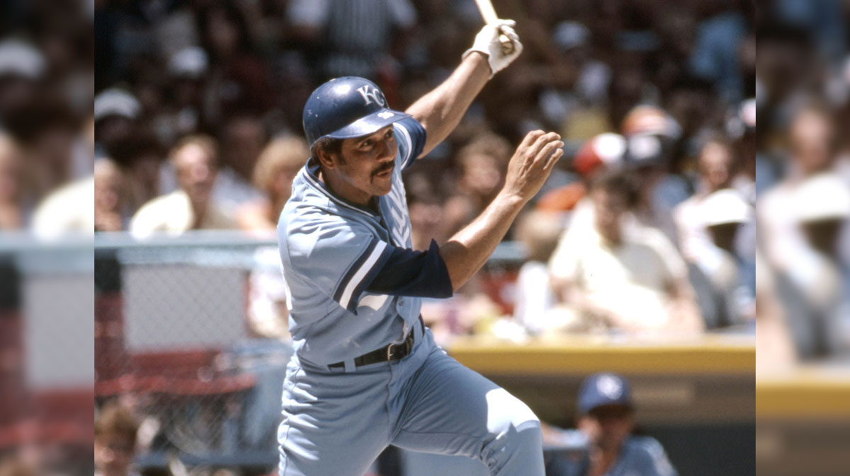 Kansas City Royals outfielder Amos Otis hits the ball against the Cleveland Indians at Cleveland Stadium.