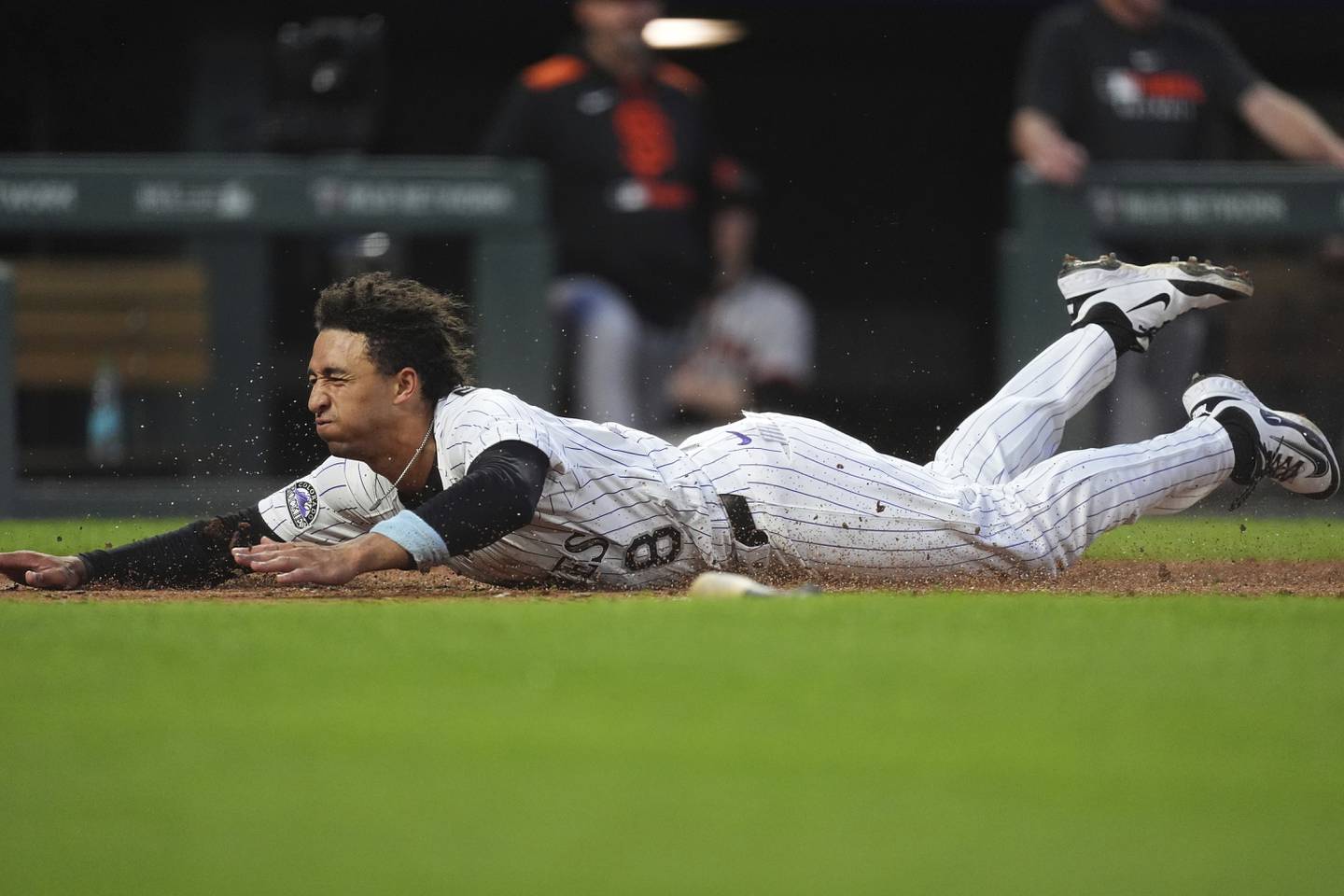 Colorado Rockies shortstop Ryan Ritter (8) in the sixth inning of a baseball game Wednesday, June 11, 2025, in Denver. (AP Photo/David Zalubowski)