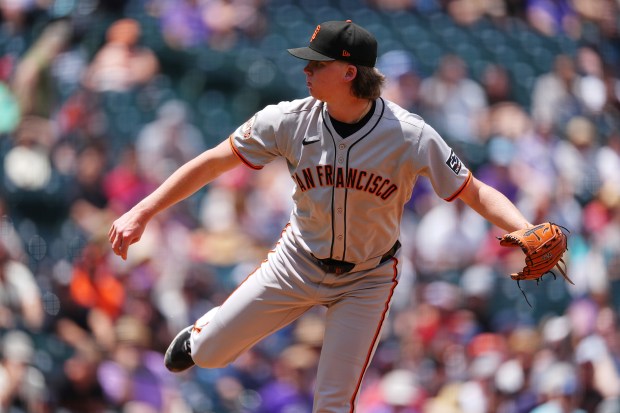 San Francisco Giants starting pitcher Hayden Birdsong works against the Colorado Rockies in the first inning of a baseball game Thursday, June 12, 2025, in Denver. (AP Photo/David Zalubowski)
