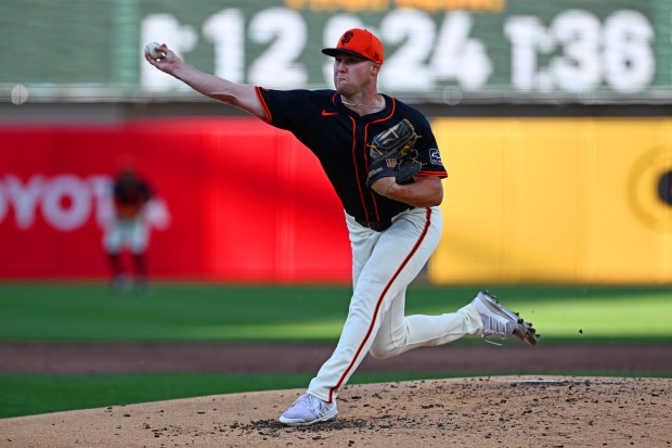 San Francisco Giants pitcher Landen Roupp (65) pitches against the Sacramento River Cats in the third inning of their exhibition game at Sutter Health Park in Sacramento, Calif., on Sunday, March 23, 2025. (Jose Carlos Fajardo/Bay Area News Group)