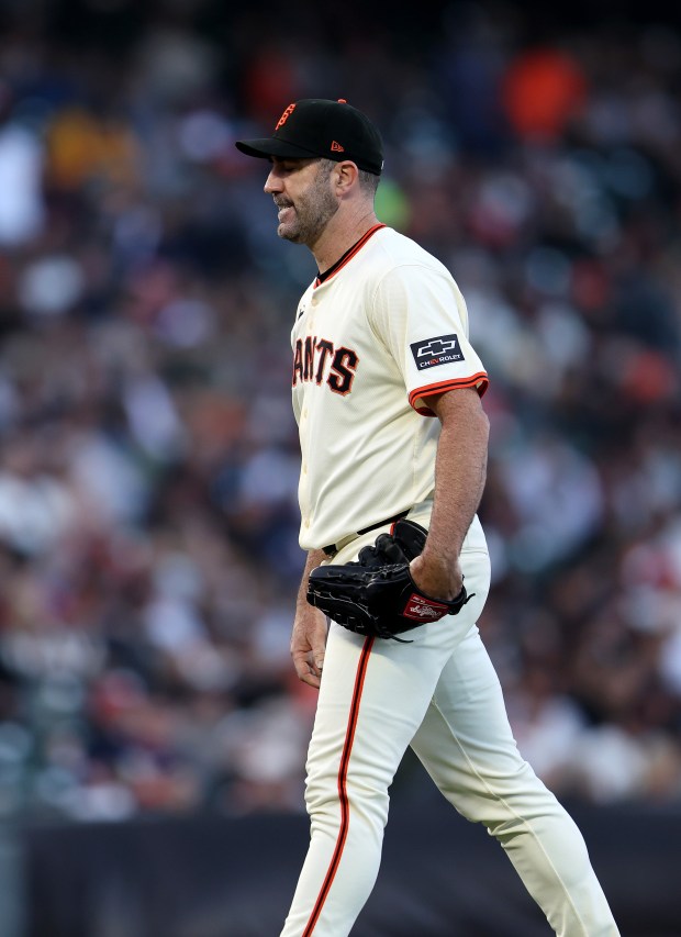 San Francisco Giants starting pitcher Justin Verlander #45 reacts after...