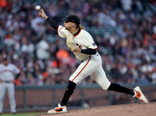 San Francisco Giants relief pitcher Spencer Bivens #76 throws against...