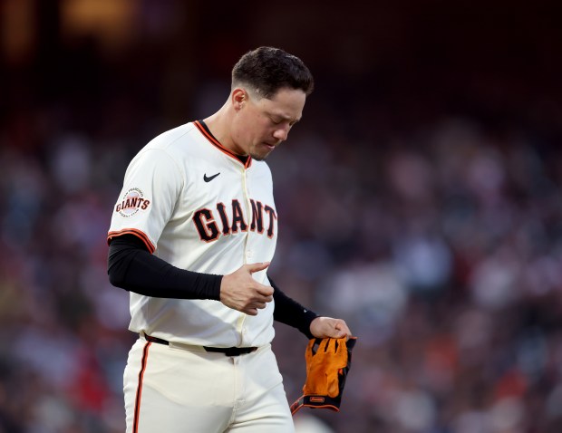 San Francisco Giants’ Wilmer Flores #41 clenches his hand after...
