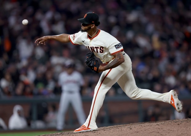 San Francisco Giants relief pitcher Camilo Doval #75 throws against...