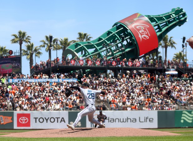 Miami Marlins starting pitcher Janson Junk #26 throws against the...