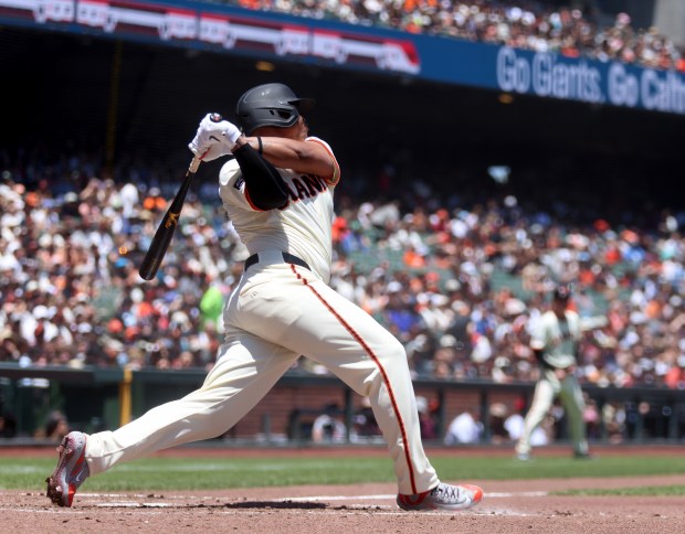 San Francisco Giants designated hitter Rafael Devers #16 hits a...