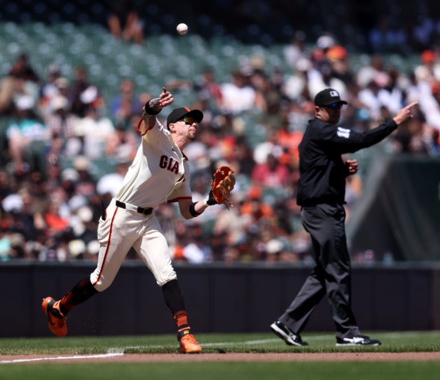 San Francisco Giants third baseman Christian Koss #50 makes the...