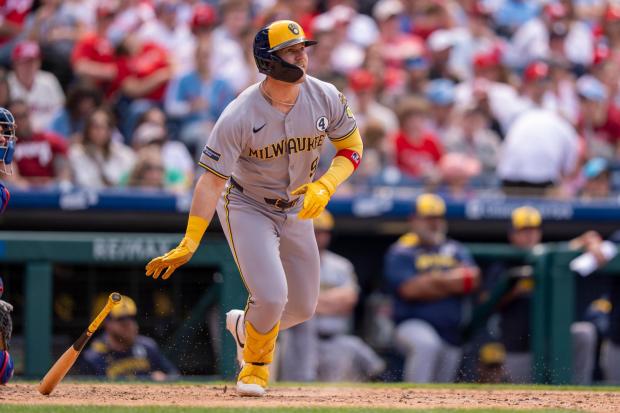 Milwaukee Brewers' Jake Bauers hits a two-run double during the seventh inning of a baseball game against the Philadelphia Phillies, Sunday, June 1, 2025, in Philadelphia. (AP Photo/Chris Szagola)