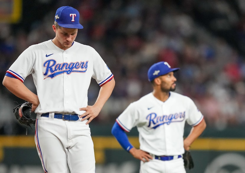 Texas Rangers shortstop Corey Seager (5) and Texas Rangers second baseman Marcus Semien (2)...