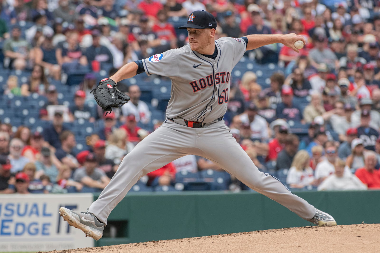 Houston Astros starting pitcher Brandon Walter delivers against the Cleveland Guardians during the first inning of a baseball game, Sunday June 8, 2025, in Cleveland. (AP Photo/Phil Long)