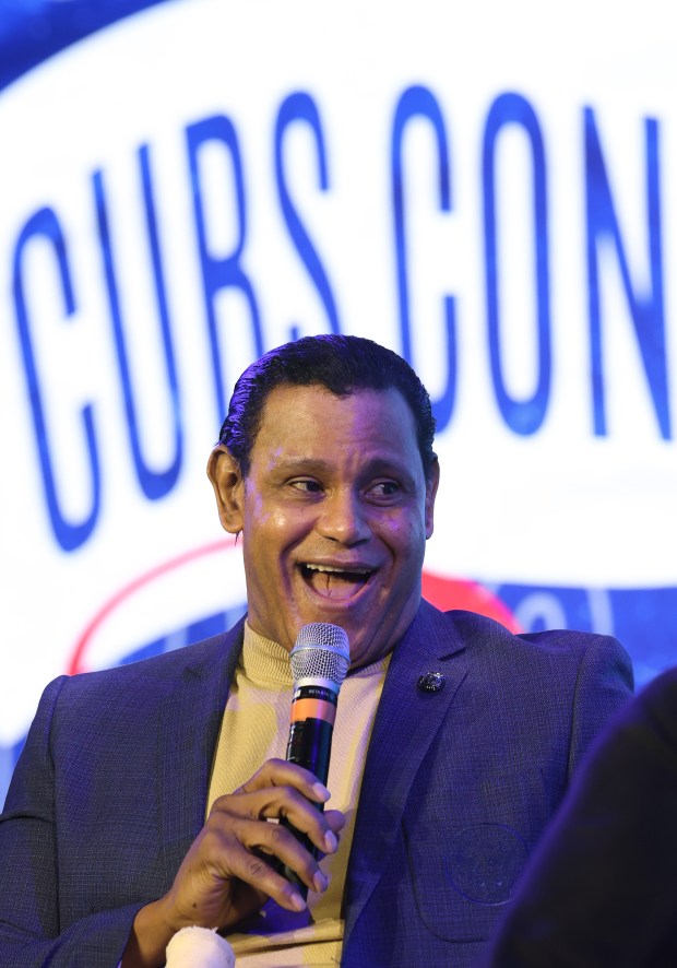 Former Cubs player Sammy Sosa sits for a question and...
