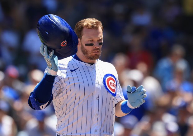 Cubs left fielder Ian Happ heads to the dugout after hitting a solo home run against the Mariners in the first inning on June 21, 2025, at Wrigley Field. (John J. Kim/Chicago Tribune)